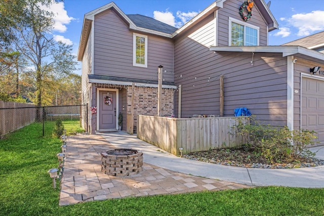 view of front of house featuring an outdoor fire pit