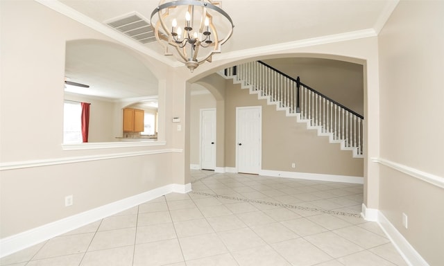 interior space featuring crown molding, light tile patterned flooring, and an inviting chandelier