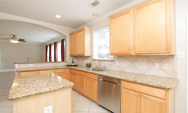 kitchen with stainless steel dishwasher, ceiling fan, light brown cabinets, and sink