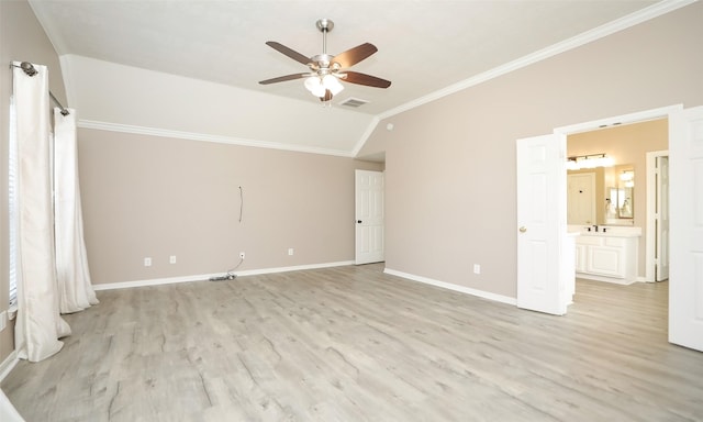 interior space featuring ceiling fan, lofted ceiling, crown molding, and light hardwood / wood-style flooring