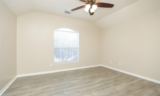 unfurnished room with light wood-type flooring, ceiling fan, and lofted ceiling