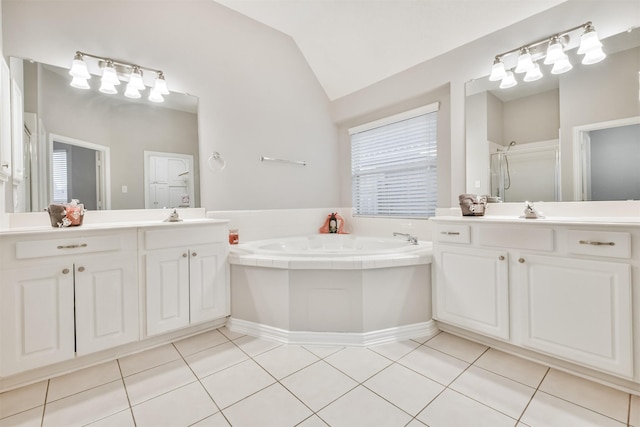 bathroom with tile patterned flooring, vanity, plus walk in shower, and lofted ceiling