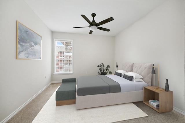 bedroom with ceiling fan and carpet floors