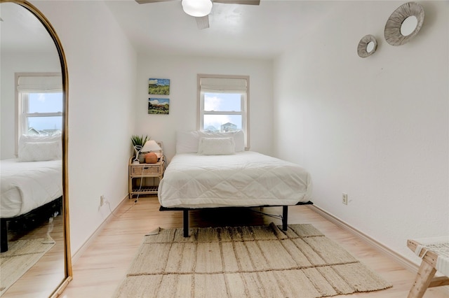 bedroom featuring ceiling fan and light wood-type flooring