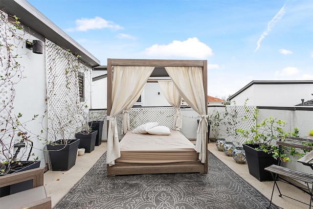 view of patio / terrace featuring fence