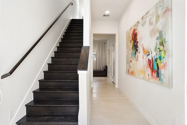 stairway featuring recessed lighting, visible vents, and baseboards