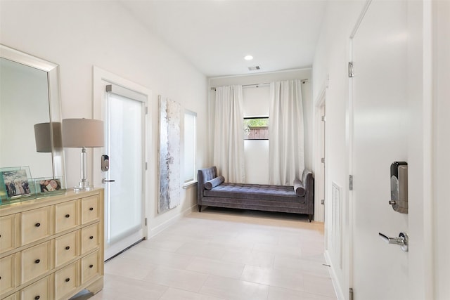 interior space featuring recessed lighting, visible vents, and baseboards