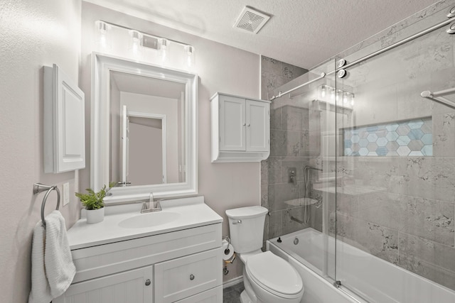 full bathroom with vanity, toilet, enclosed tub / shower combo, and a textured ceiling