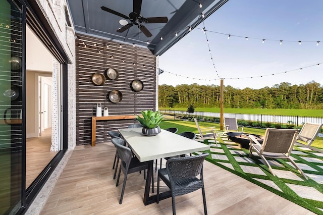 view of patio featuring ceiling fan