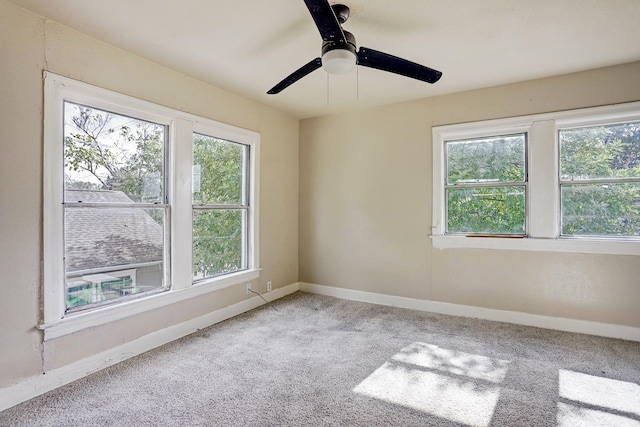 7025 Canal St, Houston, TX 77011 - empty room featuring healthy amount of natural light, carpet floors, and ceiling fan