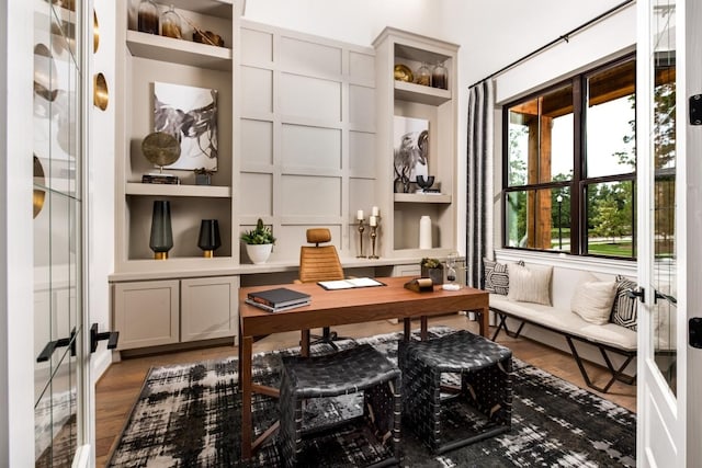 interior space with dark hardwood / wood-style flooring and french doors