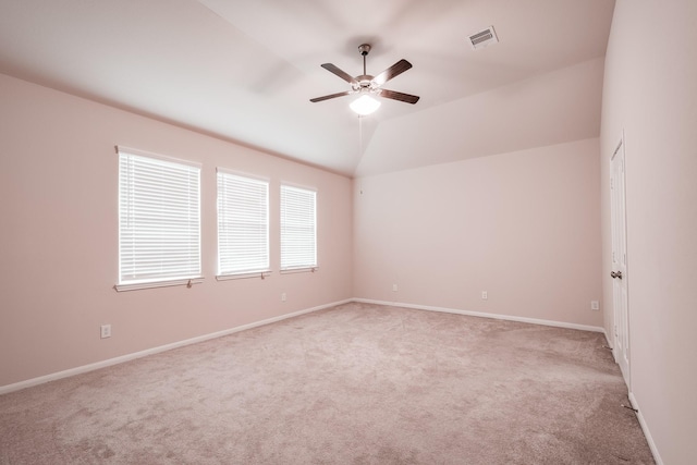 unfurnished room with light carpet, ceiling fan, and lofted ceiling