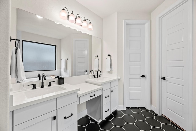 bathroom with vanity and tile patterned floors