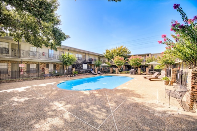 view of pool with a patio area