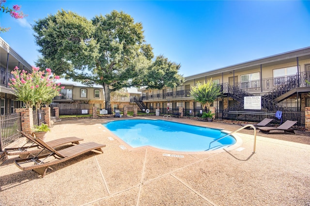 view of pool featuring a patio