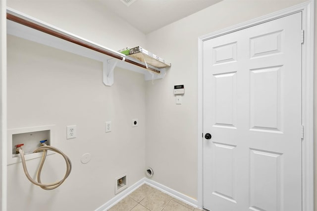 washroom with hookup for an electric dryer, washer hookup, hookup for a gas dryer, and light tile patterned floors