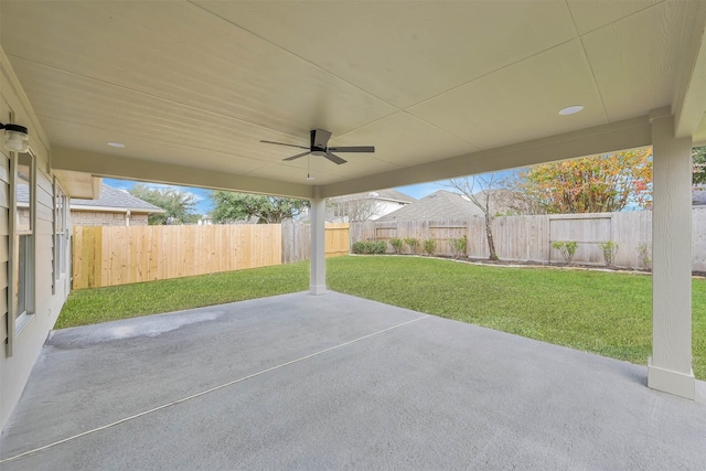 view of patio featuring ceiling fan