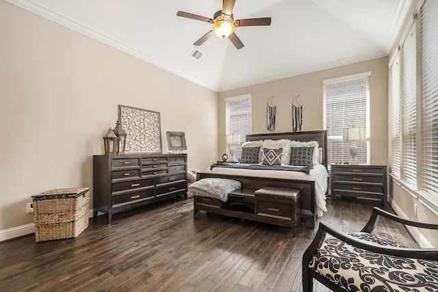 bedroom featuring ceiling fan, dark hardwood / wood-style floors, lofted ceiling, and ornamental molding