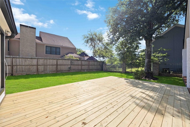 deck featuring a lawn