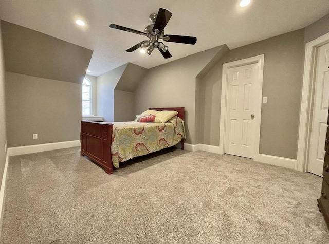 bedroom featuring light colored carpet, ceiling fan, and lofted ceiling