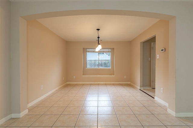 unfurnished dining area with light tile patterned floors