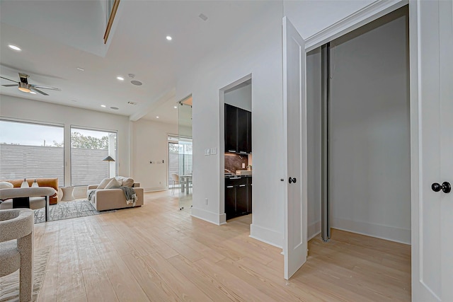 hallway with light wood-type flooring