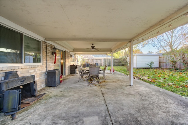 view of patio / terrace with a storage unit