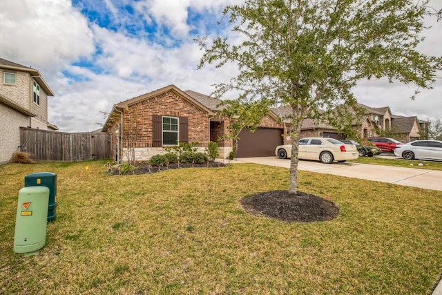 view of front of property featuring a front yard and a garage