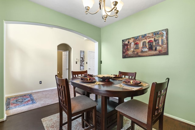 dining area with a chandelier