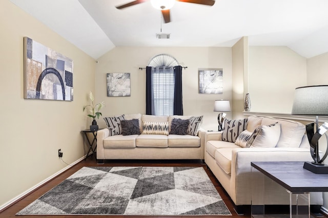 living room with dark hardwood / wood-style flooring, vaulted ceiling, and ceiling fan