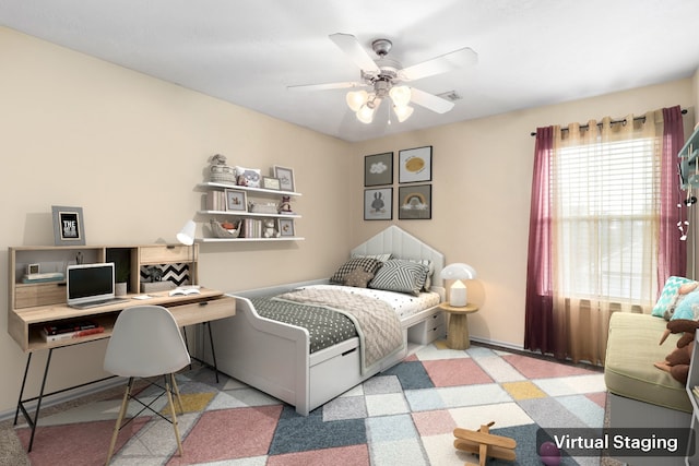 bedroom featuring ceiling fan and light colored carpet