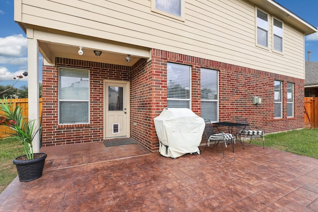 view of patio with a grill