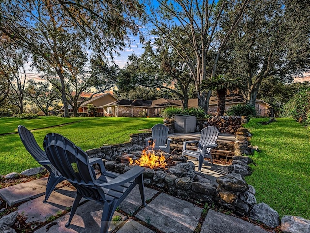 view of patio / terrace with a fire pit