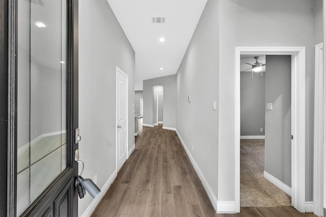 corridor featuring hardwood / wood-style flooring