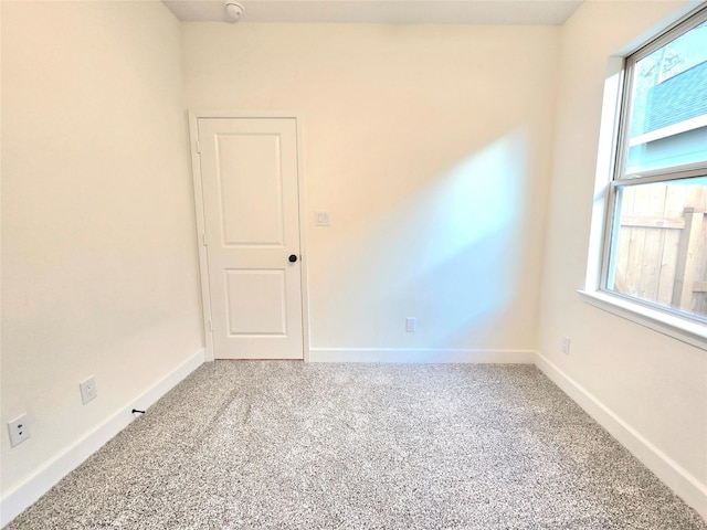 view of carpeted spare room