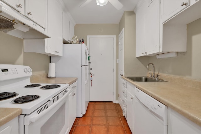 kitchen featuring white appliances, ceiling fan, sink, light tile patterned floors, and white cabinetry