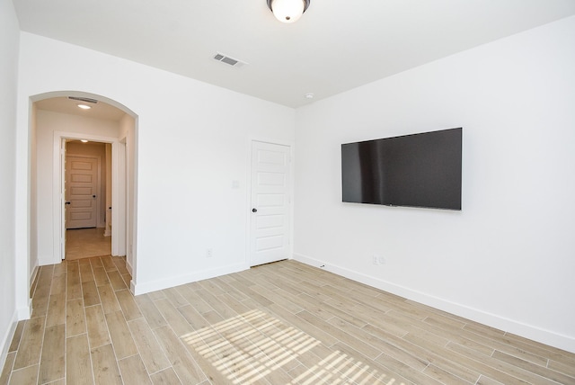 empty room featuring light hardwood / wood-style floors