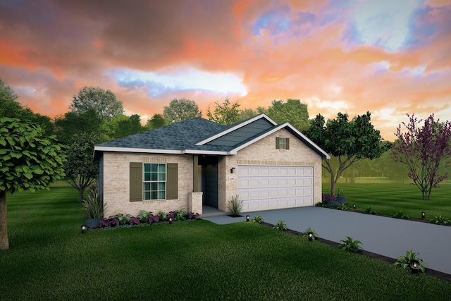 view of front of home with a garage and a lawn