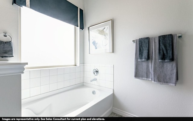 bathroom featuring a tub