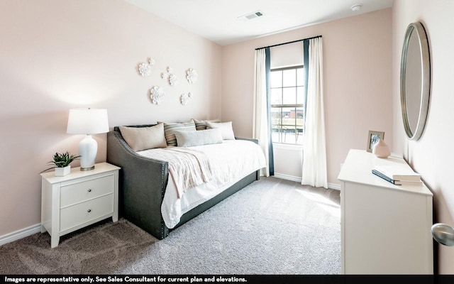 bedroom with light colored carpet