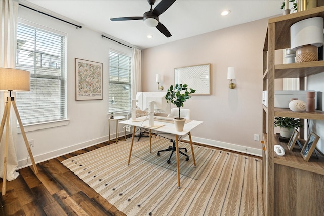 office space featuring wood-type flooring and ceiling fan