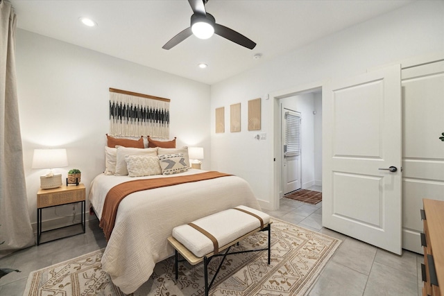 tiled bedroom with ceiling fan