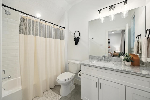 full bathroom featuring tile patterned flooring, vanity, toilet, and shower / bathtub combination with curtain