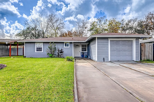 single story home featuring a garage and a front lawn