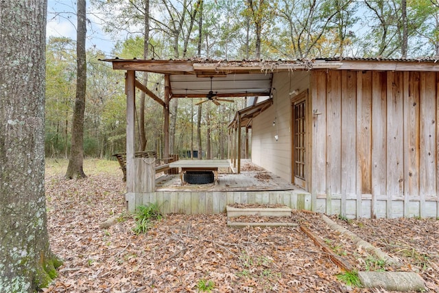 view of yard with ceiling fan