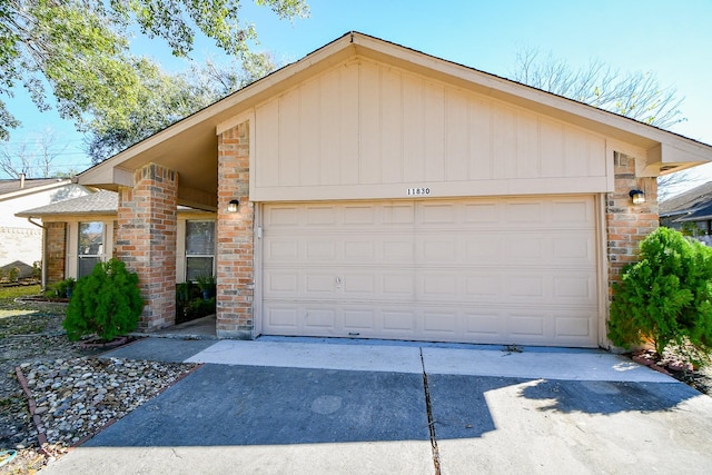 ranch-style home featuring a garage