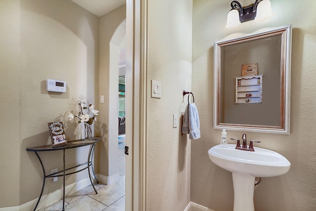 bathroom featuring tile patterned flooring