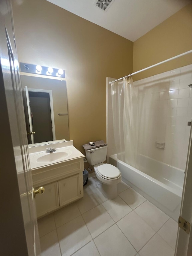 full bathroom with toilet, vanity, tile patterned floors, and shower / tub combo with curtain