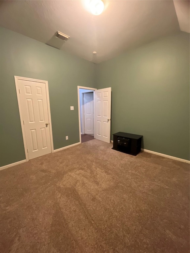 unfurnished bedroom with carpet