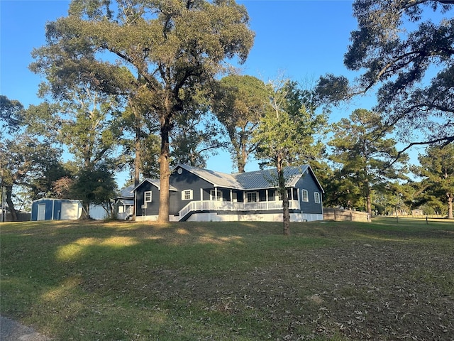 exterior space featuring a front yard